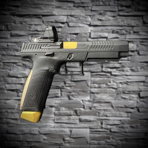 The hard nitrided P-10 F slide mandates the use of a heat-treated guide rod. . Best red dot for cz p10f